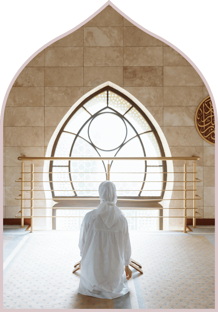 muslim woman kneeling praying