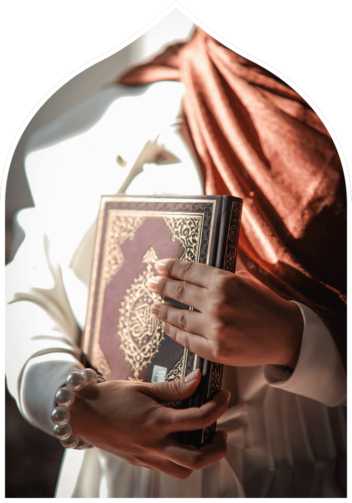 sister holding a quran